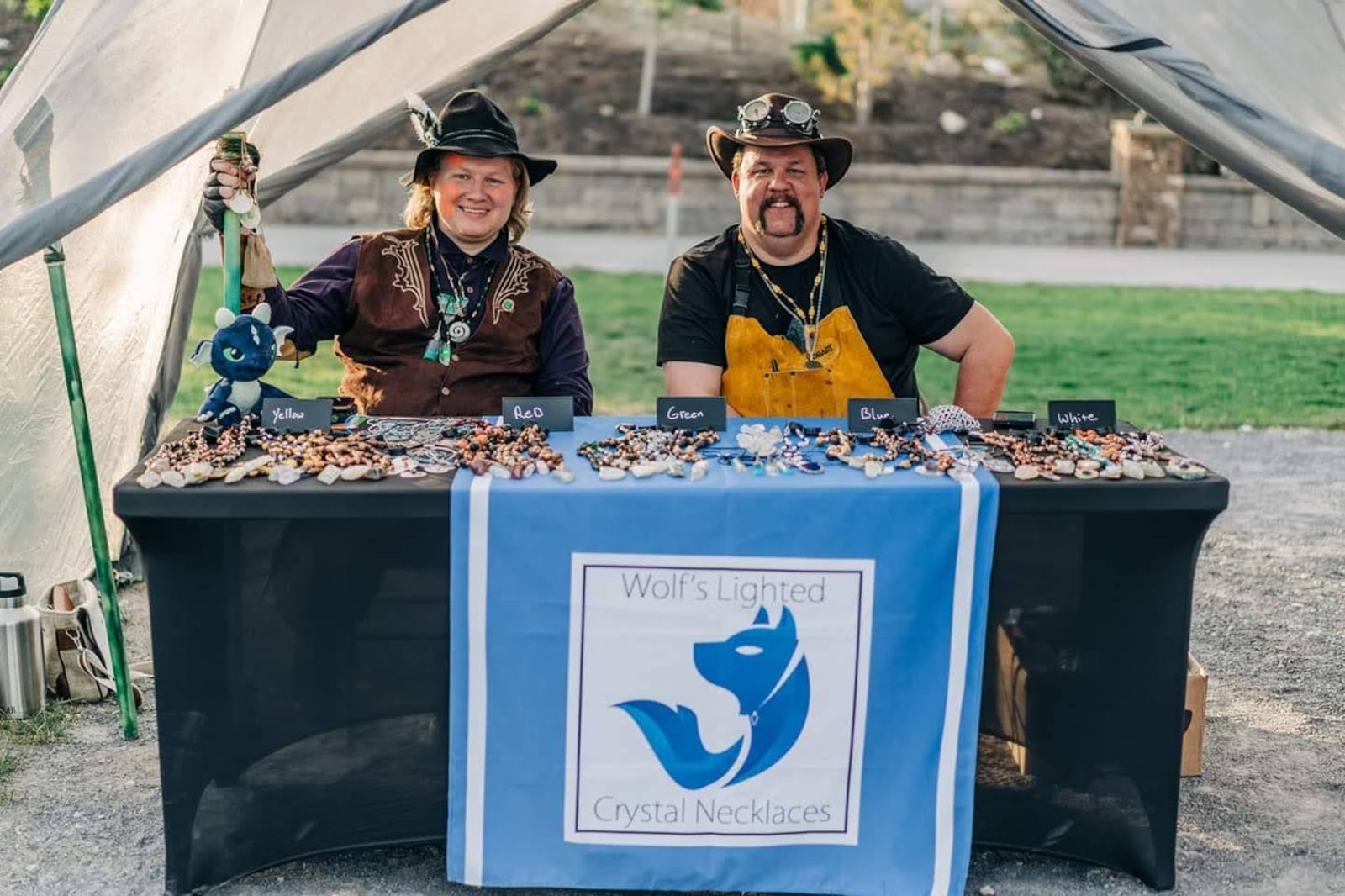 From left to right: Keegan Briggs and Jason Hodges at Hodges' first weekend as a vendor at Evermore. | Photo by Rachel Anne Robertson