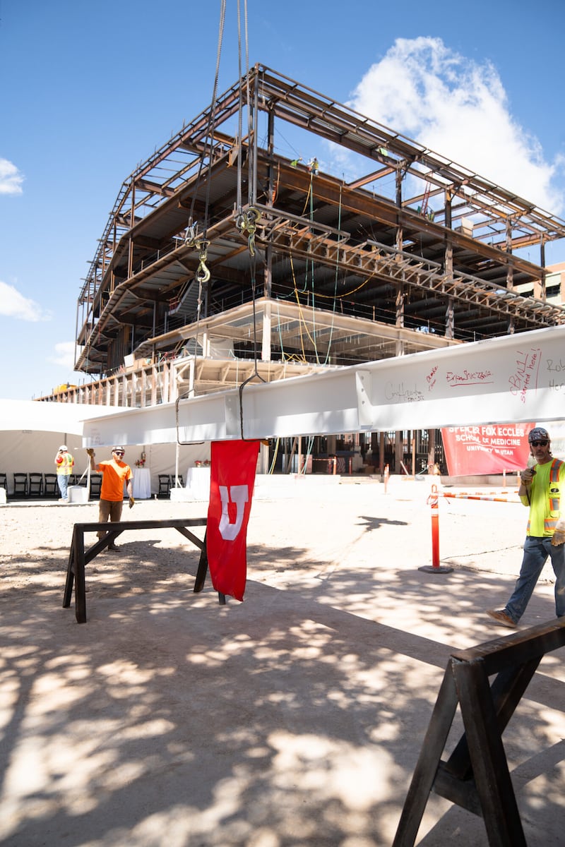 The structure of the new Spencer Fox Eccles School of Medicine building at the University of Utah was completed during a beam “topping off” ceremony on Tuesday for the state-of-the-art teaching, training and research facility.