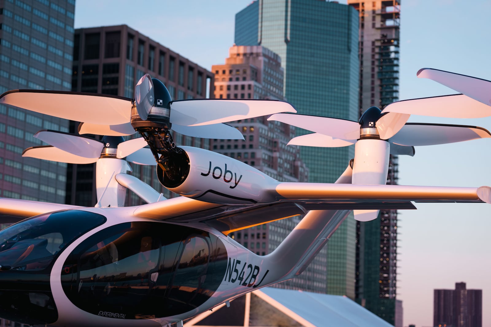 Powered by six electric motors, the Joby aircraft takes off and lands vertically, giving us the flexibility to serve almost any community. Flying with us might feel more like getting into an SUV than boarding a plane. | Photo courtesy of Joby