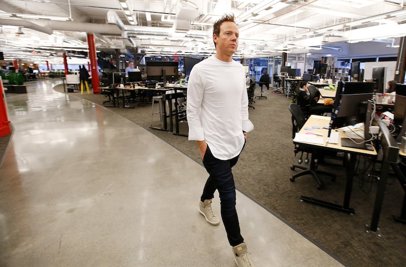 Qualtrics CEO Ryan Smith walks through the office in Provo. | Photo by Jeffrey D. Allred, Deseret News