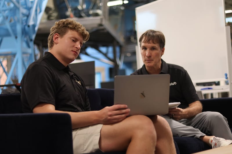 SAVOR EATS CEO Jimmy Watson seeks input on his growth strategy with Corbin Church at iHub. | Photo courtesy of iHub