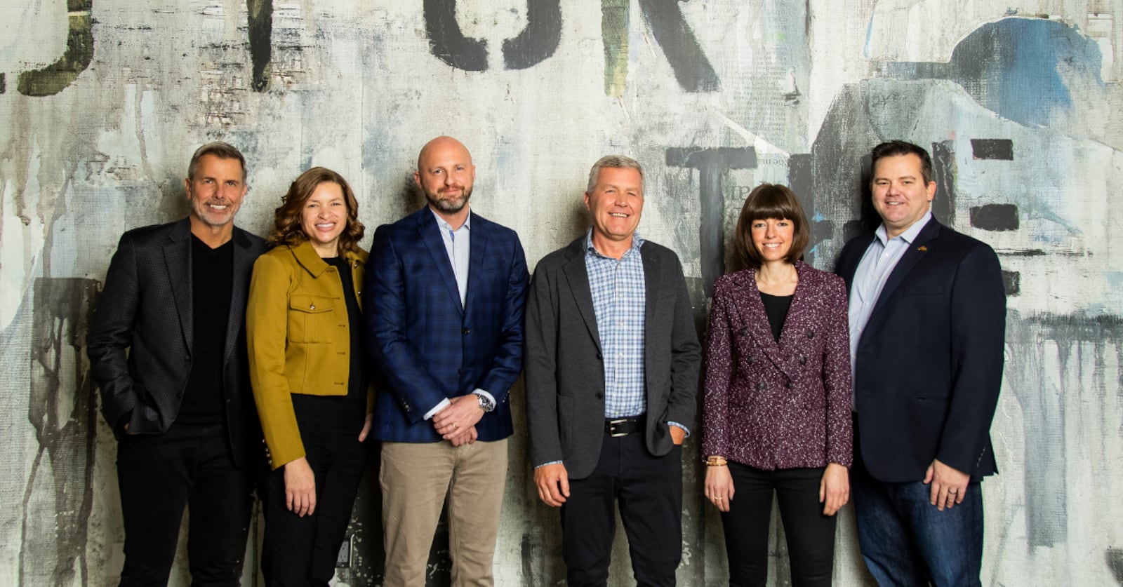 Photo by Justin Hackworth | From left to right: John Larson, Andrea Williams, Chris Barney, Jim Olson, Caroline Klein and Sam Harkness shot on location at the Delta Center