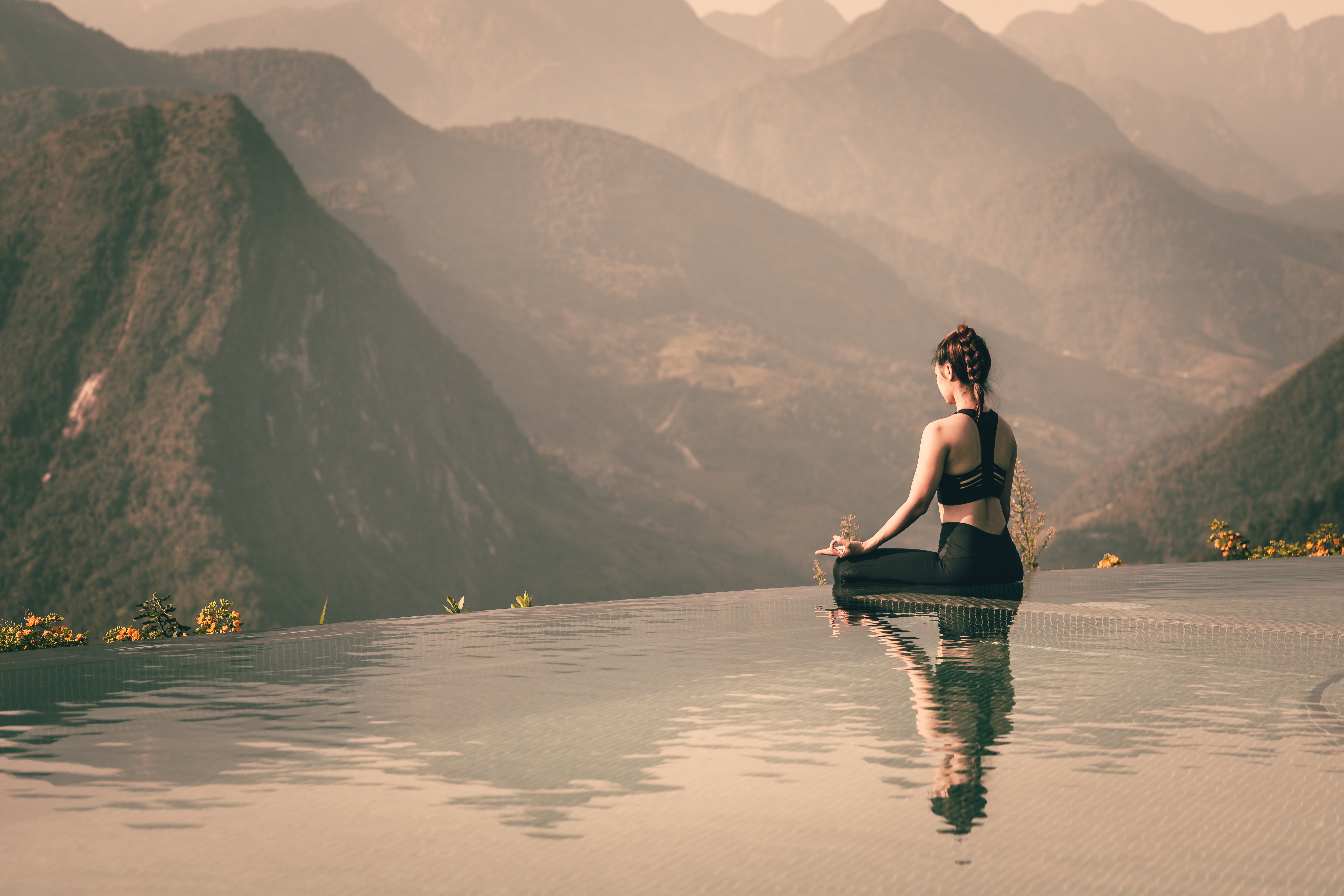 https://www.utahbusiness.com/wp-content/uploads/2019/07/Beautiful-Attractive-Asian-woman-practice-yoga-Lotus-pose-on-the-pool-above-the-Mountain-peak-in-the-morning-in-front-of-beautiful-nature-viewsFeel-so-comfortable-and-relax-in-holidayWarm-Tone_1.jpeg