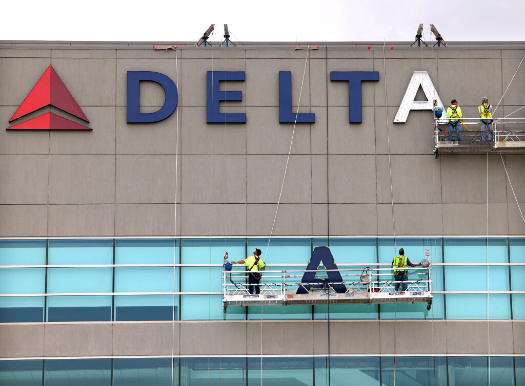Exterior signage for the Delta Center is installed in May. | Photo by Laura Seitz, Deseret News