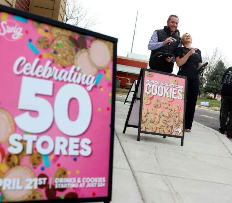 Swig CEO Rian McCartan and founder Nicole Tanner prepare to take orders at Swig's 50th store opening. | Photo by Laura Seitz, Deseret News