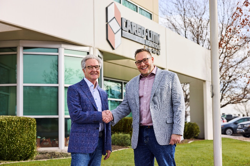 Scott Ogden, CEO and Owner of Cargo-Link, finalized the company’s acquisition with Mark McCullough, CEO of Gebrüder Weiss North America. | Photo by Michael Kunde